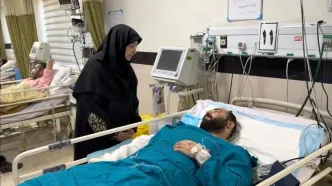 عیادت رئیس سازمان حفاظت محیط زیست از مجروحان حملات اخیر در بیمارستان فیروزگر تهران