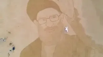چهره رهبر شهید انقلاب را روی شنهای ساحلی به تصویر کشیده شد + ویدئو