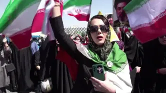 تصاویر خبرگزاری فرانسه از راهپیمایی دختران جان‌فدای ایران