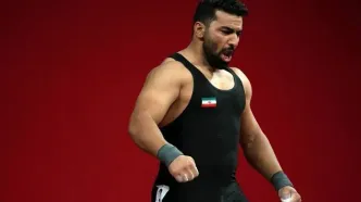 قهرمان سابق وزنه‌برداری متهم به قتل، خود را تسلیم پلیس کرد