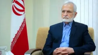 تصویری دیده نشده از دوران جوانی شهید کمال خرازی با کروات/ معاون وقت وزارت خارجه در کنار بازرگان و قطب زاده