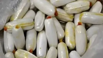 معده قاچاقچی، انبار تریاک