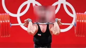 قهرمان ایرانی وزنه برداری جهان تسلیم پلیس شد