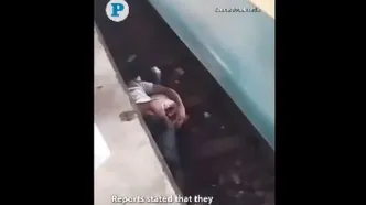 نجات معجزه‌آسای یک نوزاد از زیر چرخ‌های قطار توسط پدر فداکار