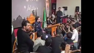 تصویر رهبر انقلاب در یک محفل قرآنی در عراق
