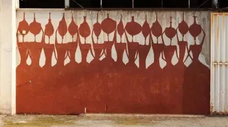 گالری جدید بنکسی ایران/ گزارشی از نقاشی‌های «میرزا حمید» در بناهای جنگ‌زده شهر