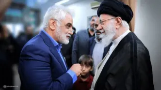 تصویری از شهید طهرانچی در کنار امام شهید