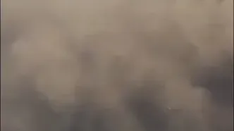 طوفان و دیواری از گرد و خاک هاربین چین را در تاریکی فروبرد