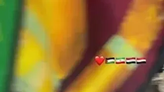 جکسون هینکل در حال توزیع شربت نذری در مصلی تهران