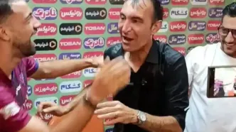 حمله آبی بازیکنان نساجی به رضا عنایتی