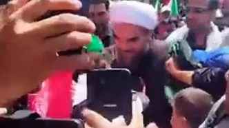 حضور پدرِ نوه 14 ماهه رهبر شهید در مراسم امروز