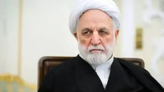 تصویر محسنی اژه ای در مراسم تشییع رهبر شهید