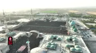 فیلم کامل اقامه نماز بر پیکرهای شهدای خانواده رهبر شهید توسط جوادی آملی