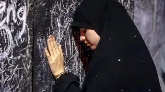 تصاویر؛  دیوار بتنی مراسم وداع