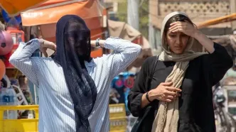 تصاویر؛ گرمای ۵۰ درجه، جنگ و زندگی در اهواز