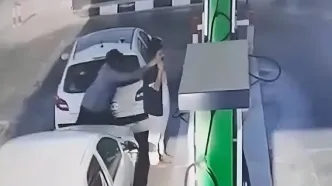 فیلم لحظه قاپیدن موبایل پسر جوان در پمپ بنزین شهرک غرب تهران