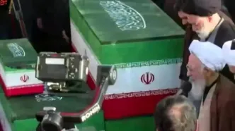 اقامه نماز بر پیکرهای مطهر امام شهید و خانواده ایشان در مسجد جمکران