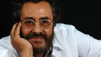 سفر در زمان؛ خسرو شکیبایی در دوران سربازی و در کنار یک توپ جنگی؛ اوایل دهه 40
