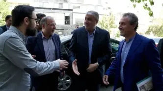 بازدید رییس سازمان انرژی اتمی از روزنامه ایران