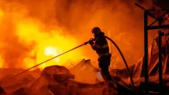 تصاویر؛ حمله روسیه به یک انبار در کی‌یف