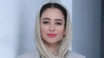 چهره متفاوت الناز حبیبی با هدبند گل‌دار و سکه‌دوزی