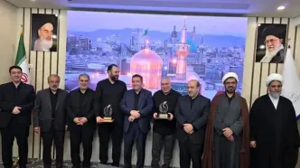 تجلیل از مقام پدر و پسر شهید شوشتری در ثبت اسناد خراسان رضوی