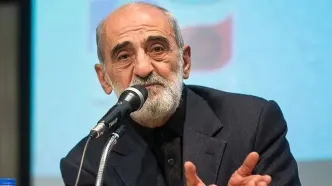 شریعتمداری: آتش‌زننده سطل آشغال، فرزند ملت نیست