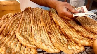 زنجیره نان در پیچ و خم چالش‌ ها؛ از گندم نامناسب تا ضایعات ۳۰ درصدی