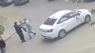 کتک زدن زن در وسط خیابان به یک دلیل عجیب