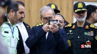 پزشکیان با اسلحه در کنار رادان +عکس