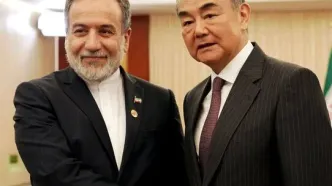 تصاویری از دیدار عراقچی و همتای چینی