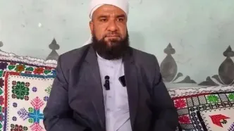 تصویری از پیکر مولوی شهید یوسف گرگیج در تجمع شبانه