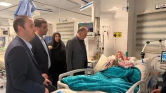دیدار مدیران بیمه دی با خانواده یک مادر شهید در قم