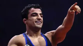اولین طلای ایران: قهرمان المپیک تحقیر شد!