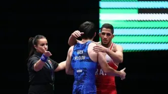 کشتی آزاد قهرمانی جهان| عموزاد به یک‌چهارم نهایی رسید