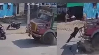 نجات معجزه‌آسای دختر موتورسوار پس از تصادف با کامیون