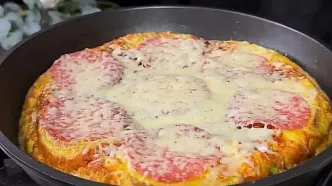 طرز تهیه پیتزای فوری با نان باگت و تخم مرغ در ماهیتابه